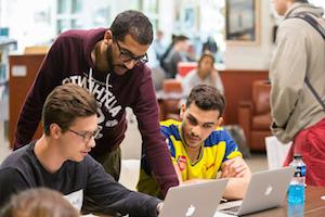 students working at computer